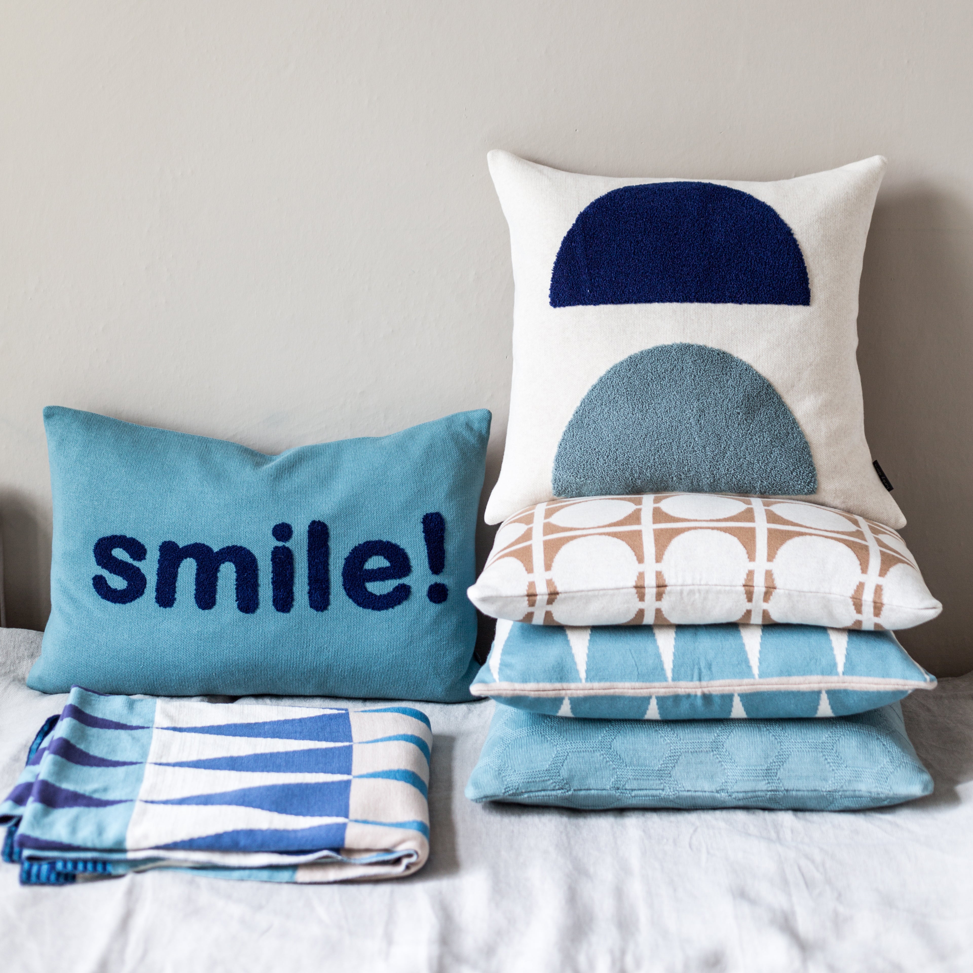 Blue throws and clearance cushions